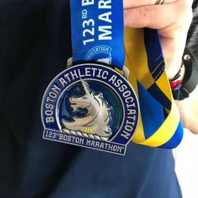 123rd-2019-boston-marathon-medal-.webp