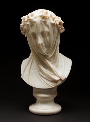 Đây là một tác phẩm mang tên The Veiled Lady (1860) của Raffaelle Monti - một nhà điêu khắc người...